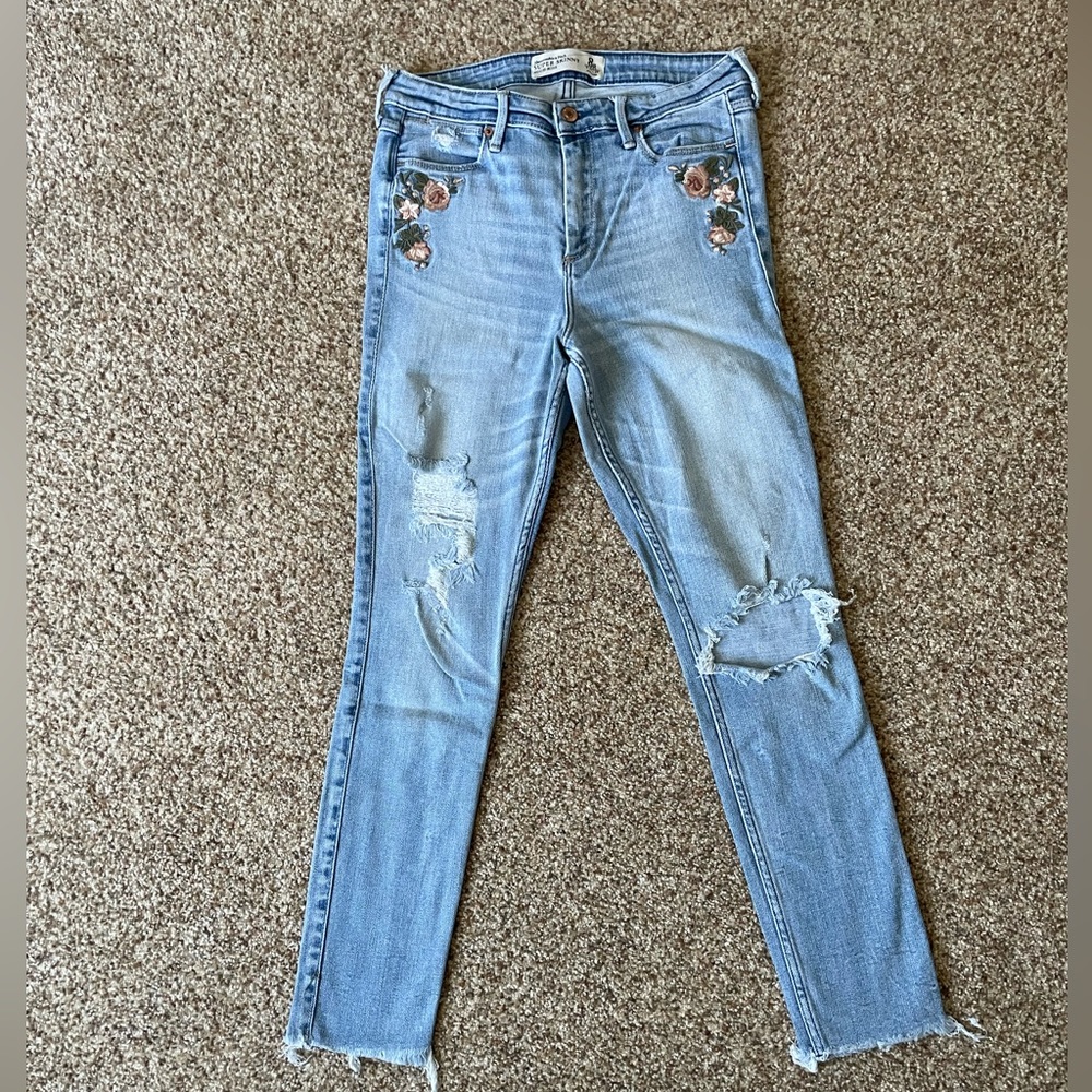 Abercrombie & Fitch light wash distressed skinny jeans with floral embroidery